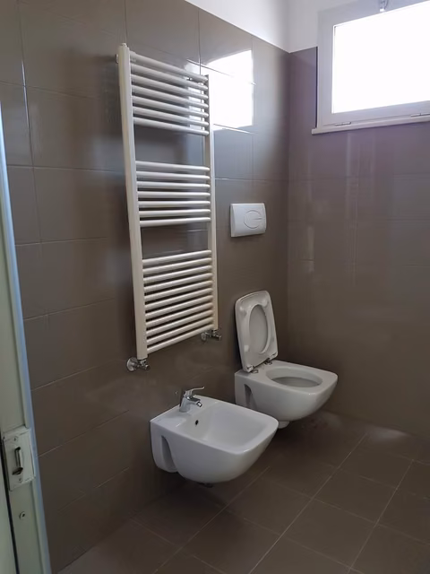 Bagno realizzato da CMI Impianti Tecnologici
